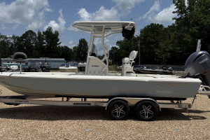 Used 2024 Skeeter SX241 Center Console Boat Ice Blue and White